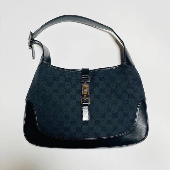 Gucci Handbags - Gucci Black and Gold Shoulder Bag
